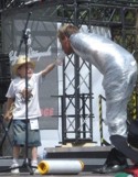  A kid helps Paul bea... 